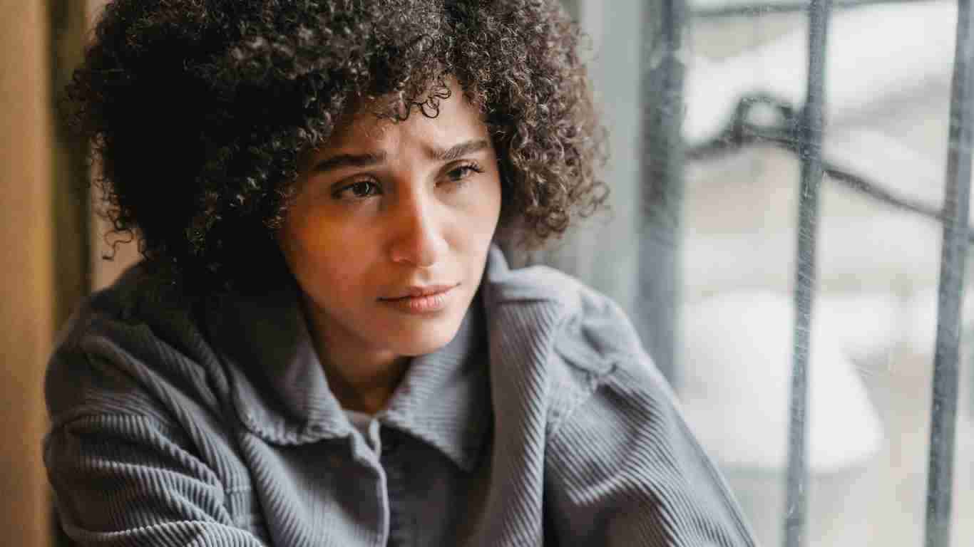 A woman who looks totally helpless