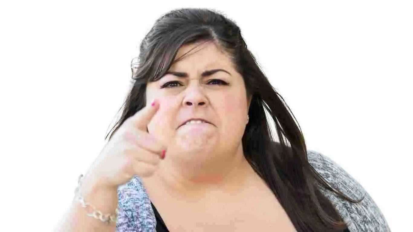 A woman pointing her finger in an aggressive way