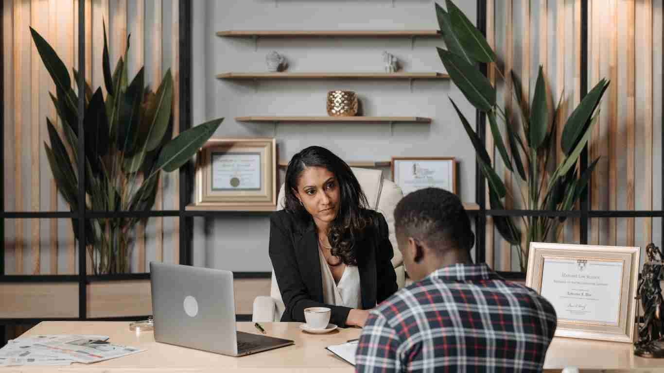 A lawyer talking to her client