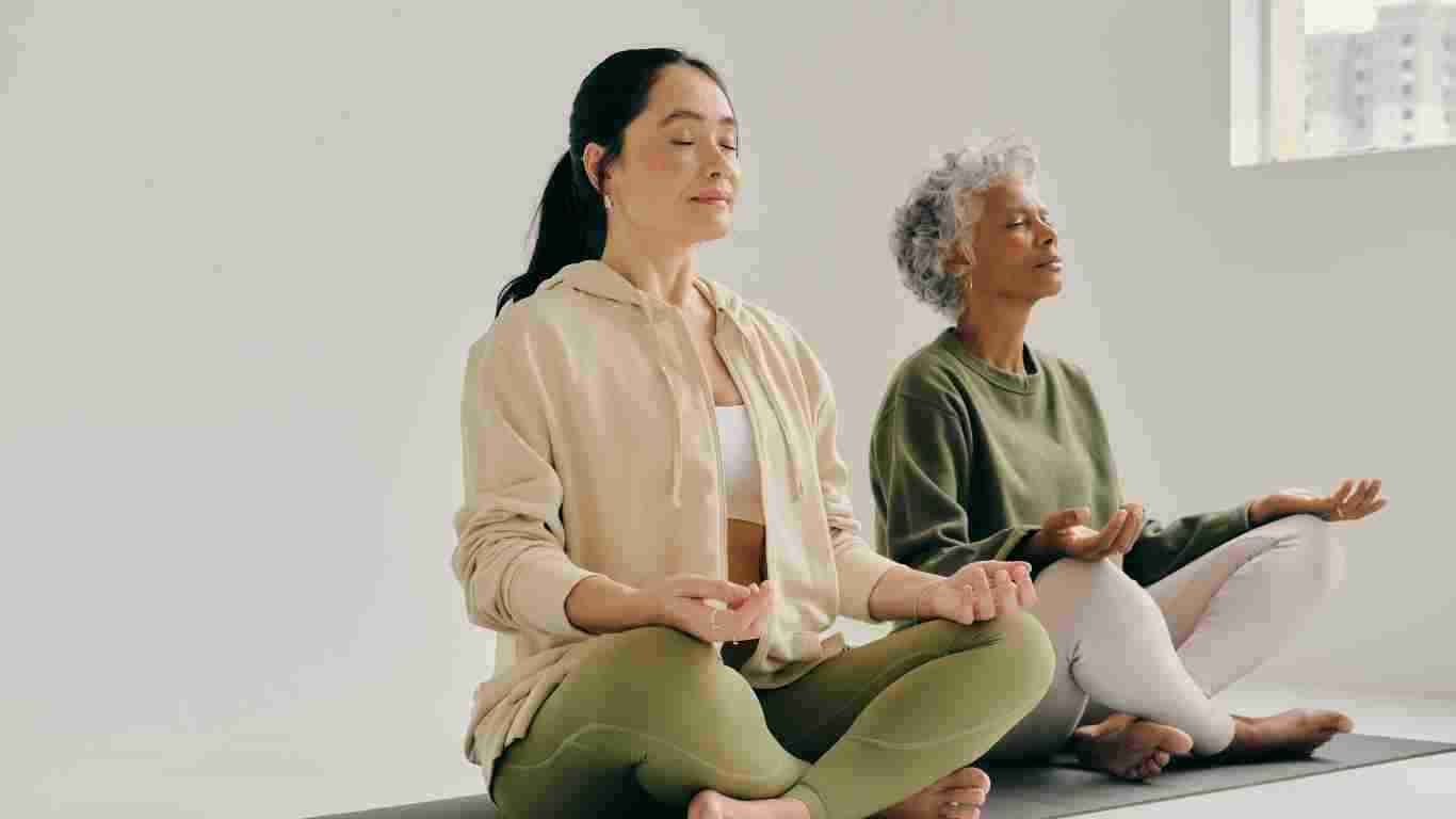 Two ladies meditating
