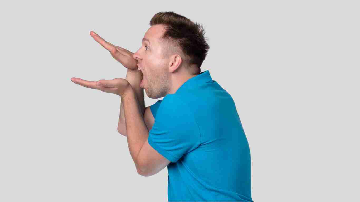 A man spouting a stream of rubbish