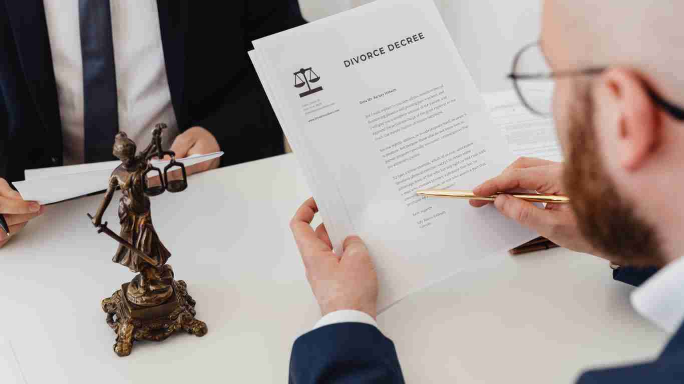 A man holding a divorce decree