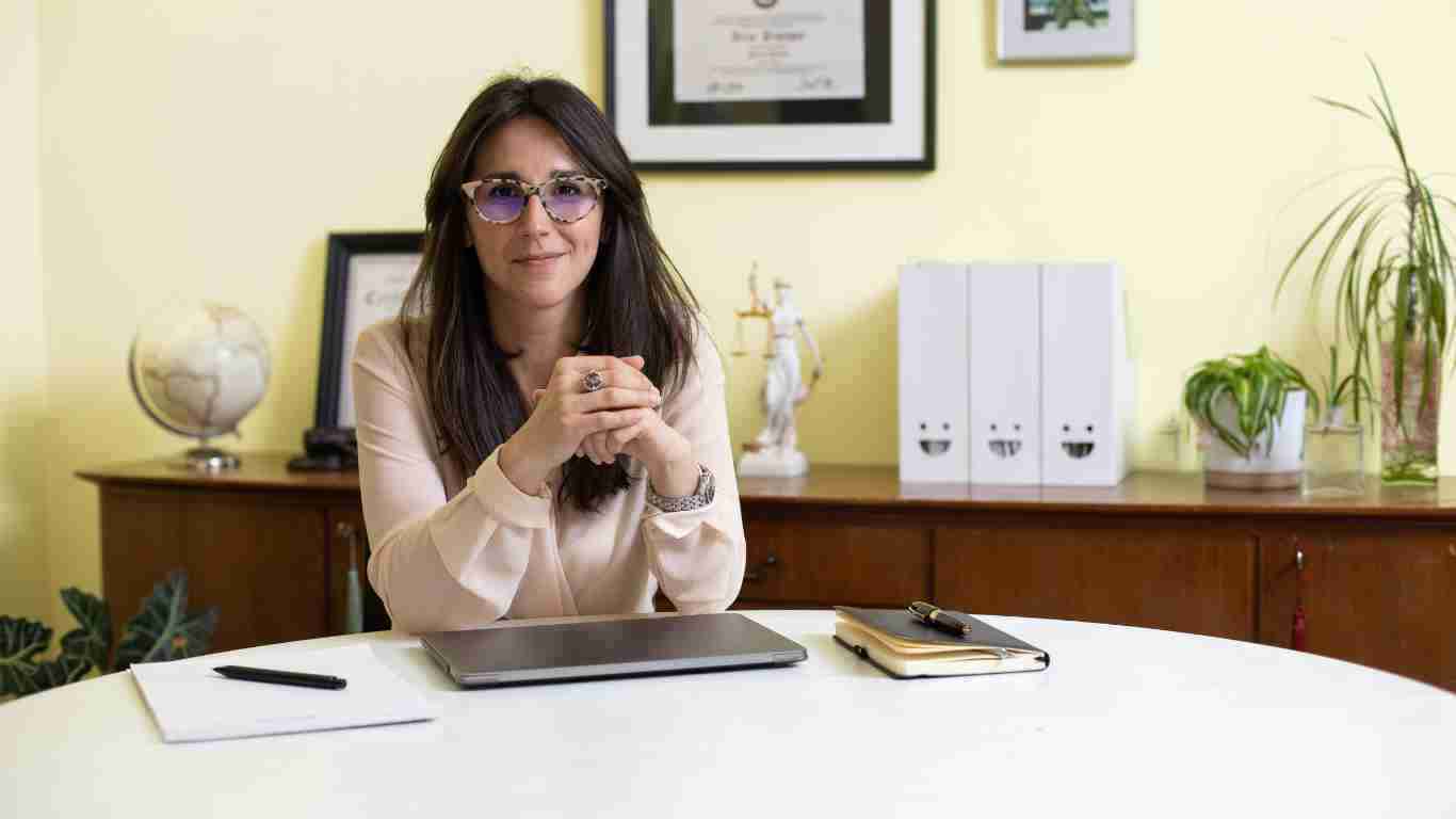 A female lawyer sitting at her desk
