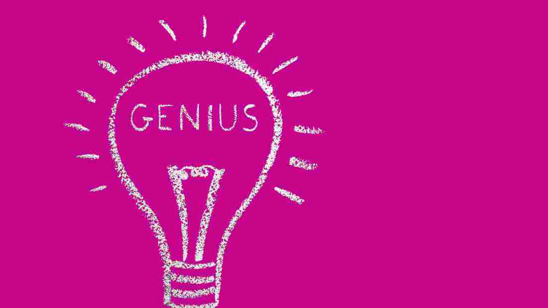 A drawing of a lightbulb with the word genius in it