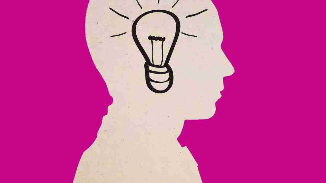An illustration of a lightbulb in a human skull
