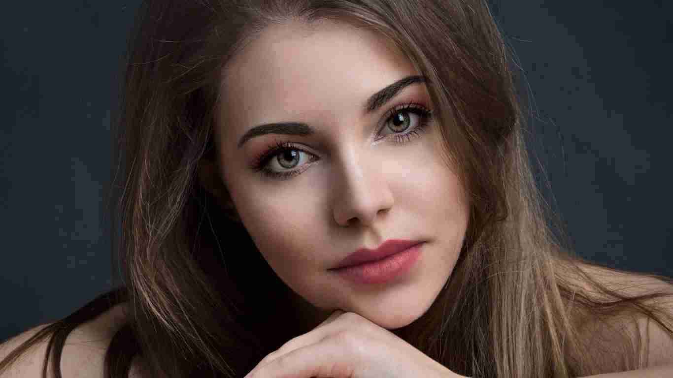 A beautiful woman posing for the camera