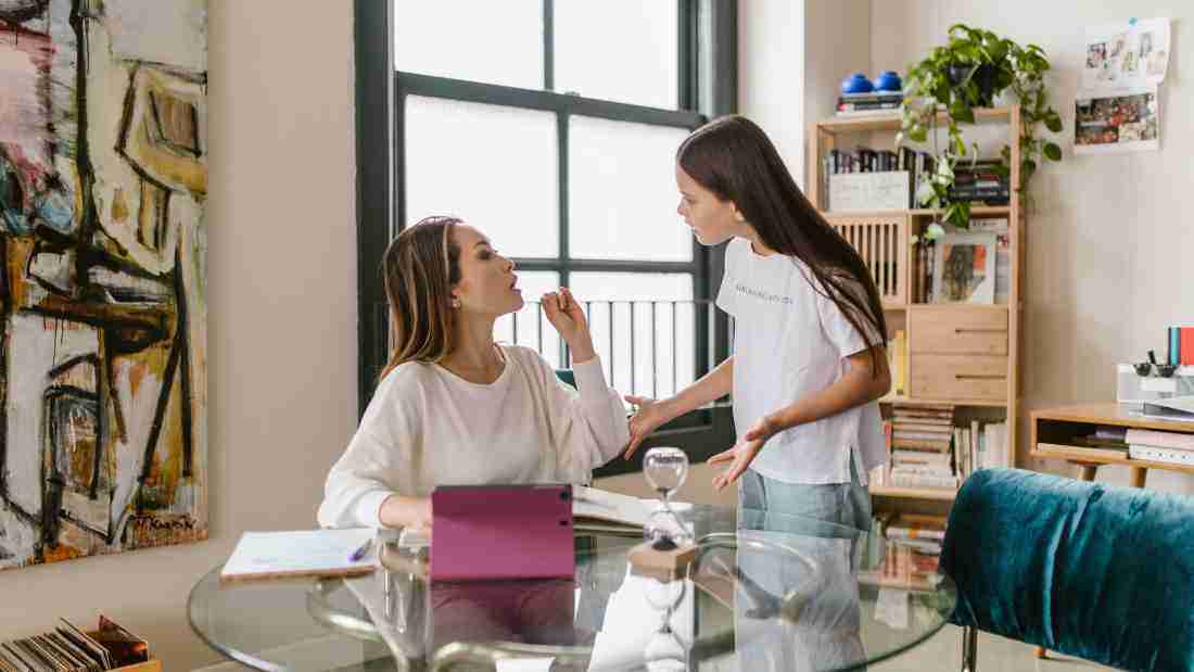 A mother and her daughter arguing about something