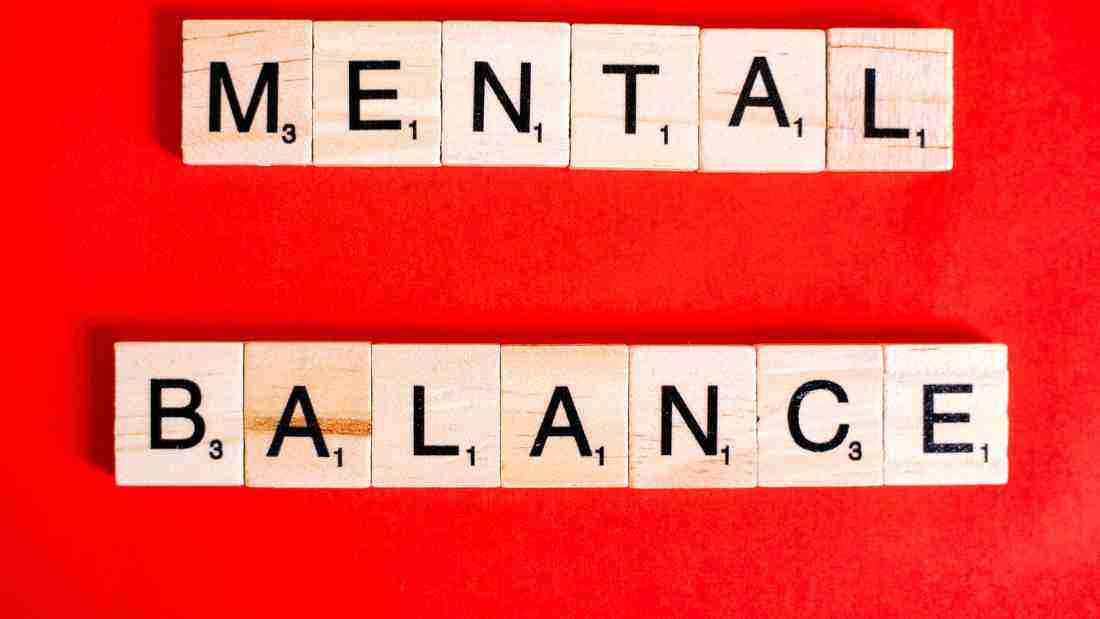 Wooden blocks forming the words MENTAL BALANCE