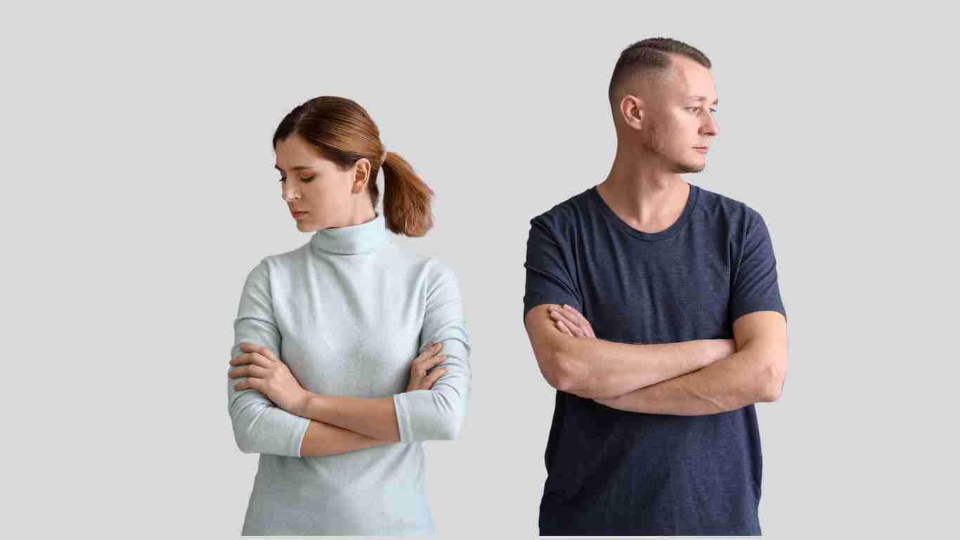 An unhappy couple refusing to look at each other