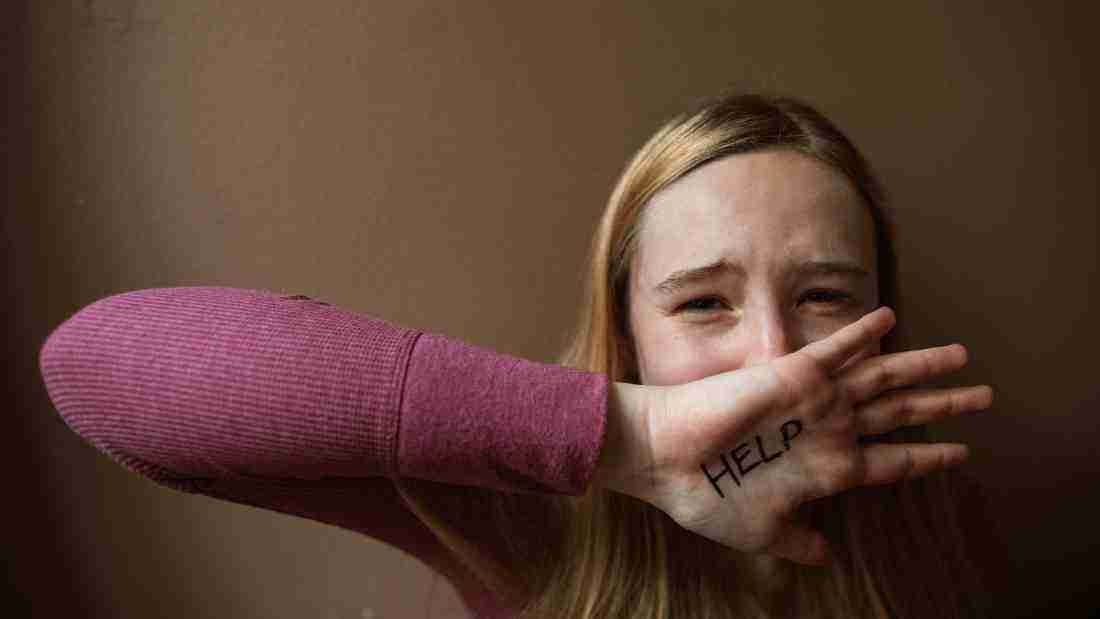 A woman asking for help