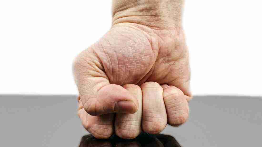 A clenched fist, indicating violence