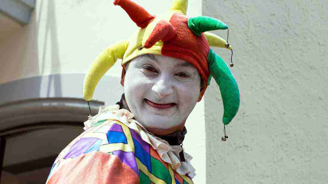 A clown in full makeup