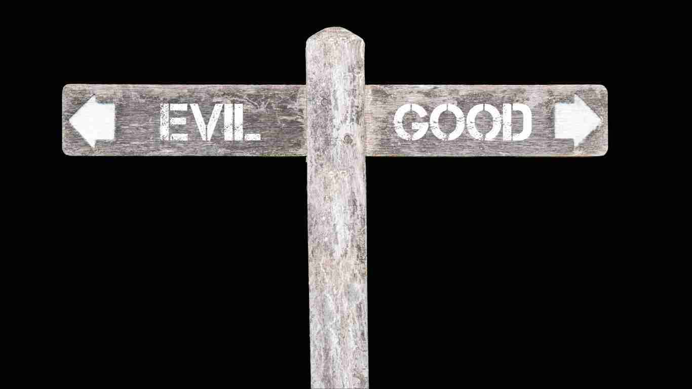 road signs pointing to good versus evil