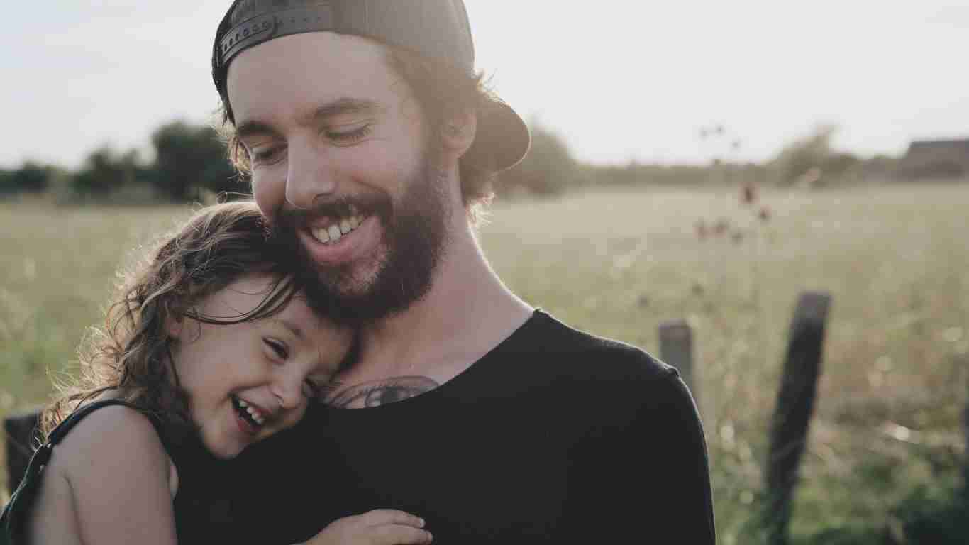 A father hugging his daughter