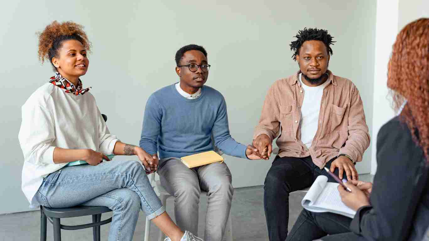 A support group with their therapist
