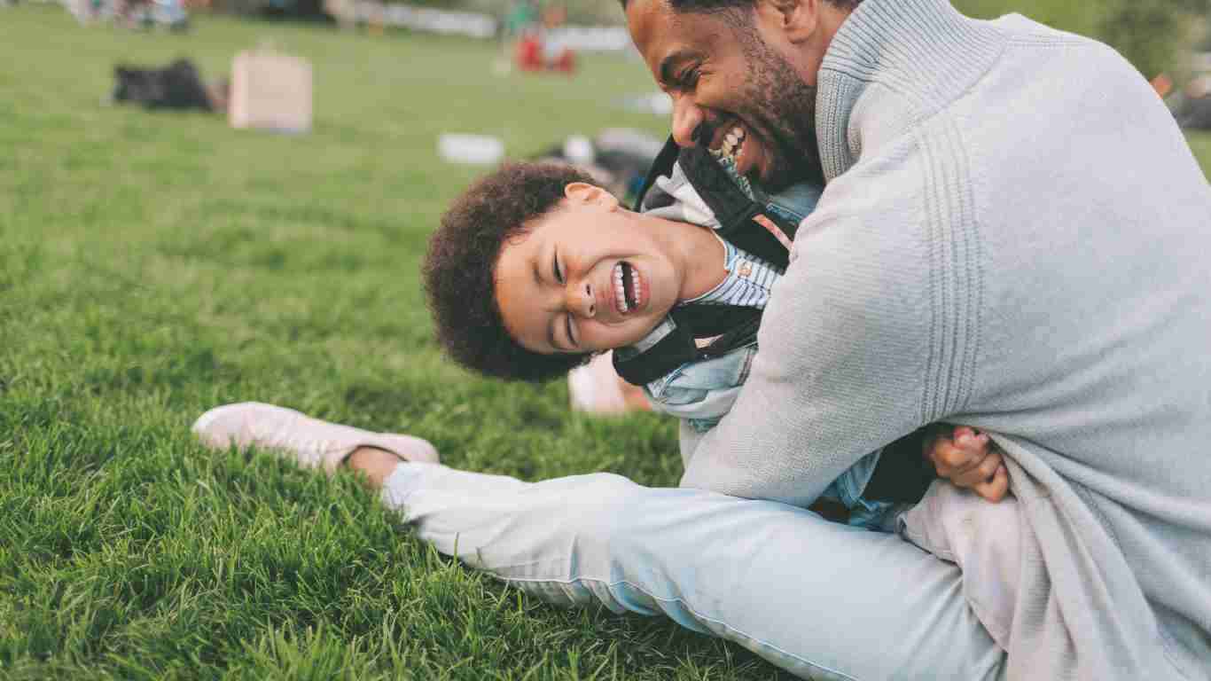 A man playing with his child