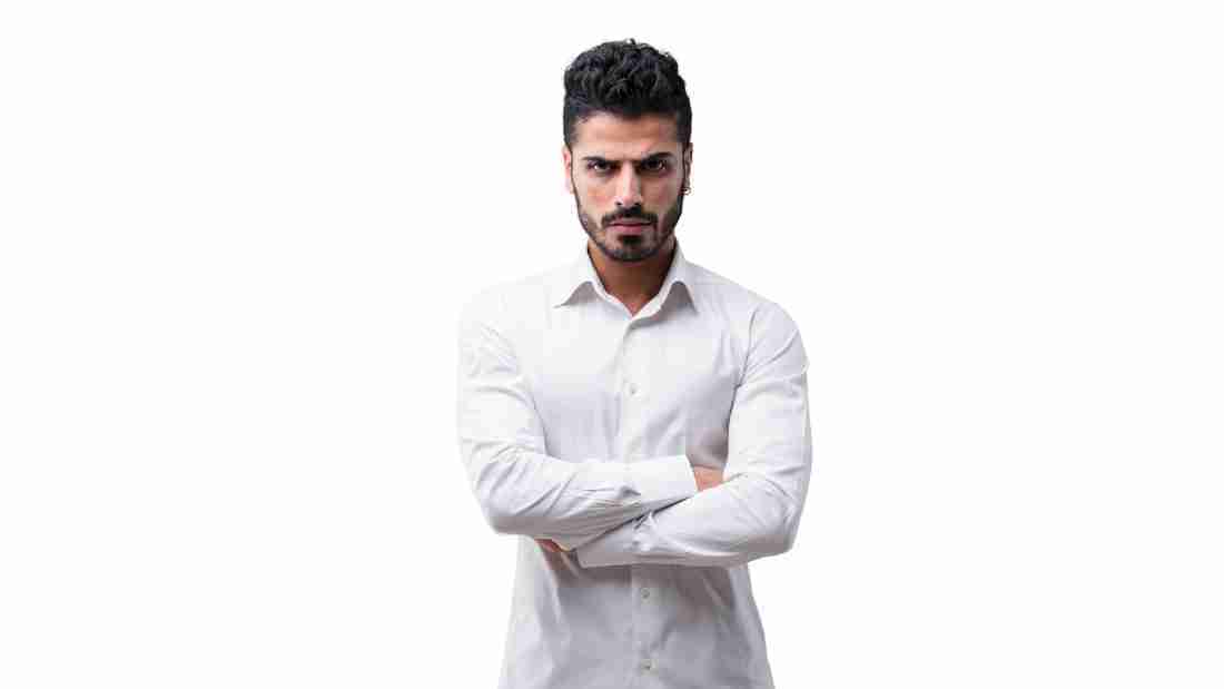 A man glaring aggressively at the camera
