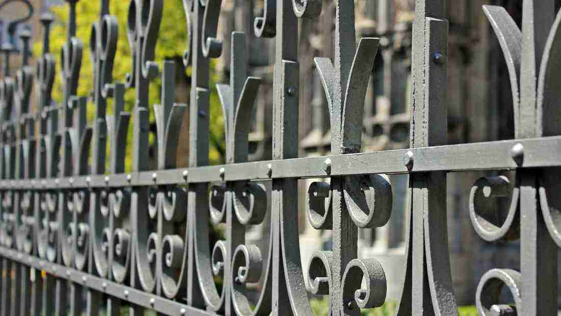 A metal fence, indicating a boundary