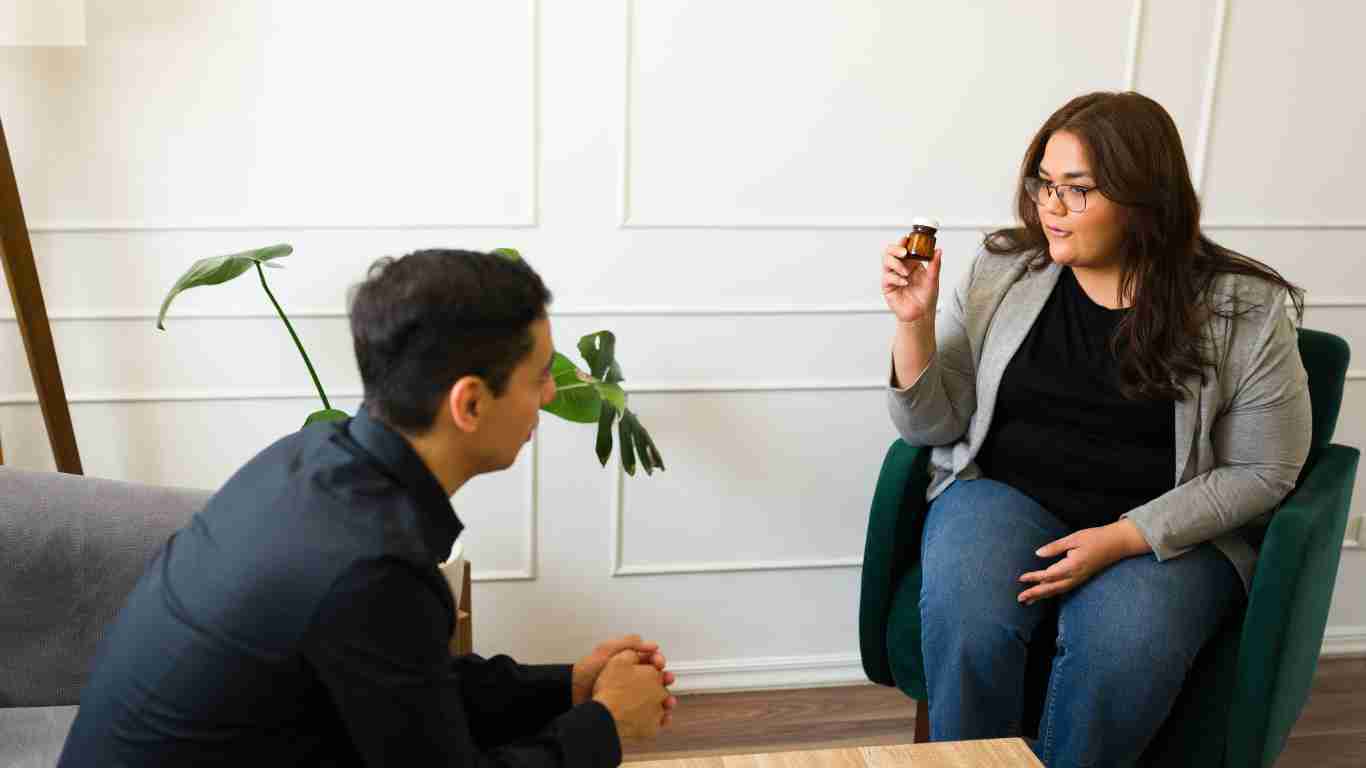 A therapist talking to her client