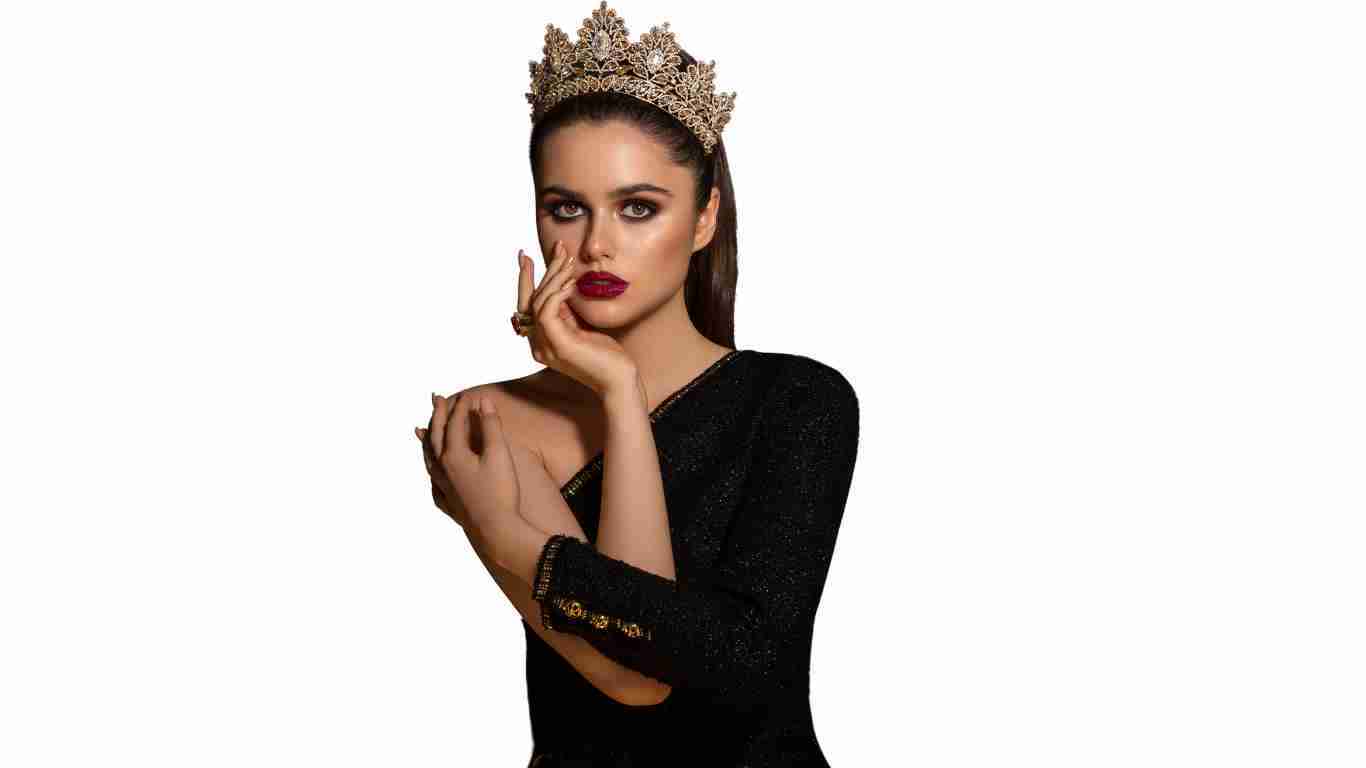 A woman showing off with a crown on her head