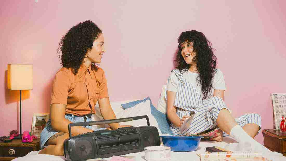 Two girls in conversation