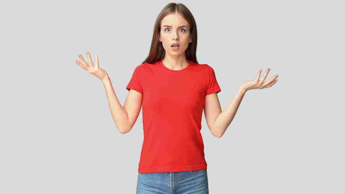 A totally helpless woman shrugging to indicate she does not know what to do