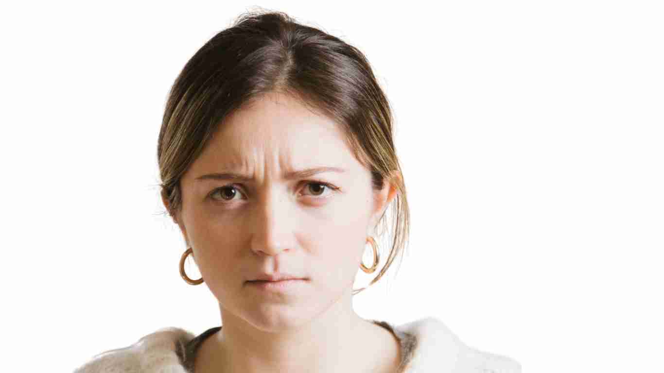 A woman who looks totally overwhelmed