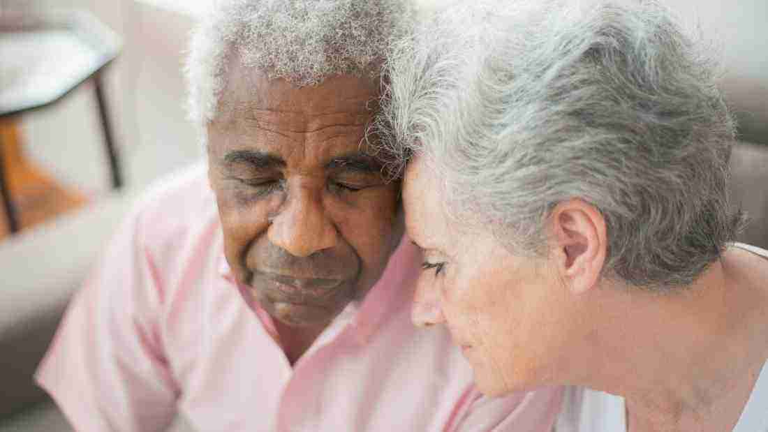 An old couple who appear to be very sad