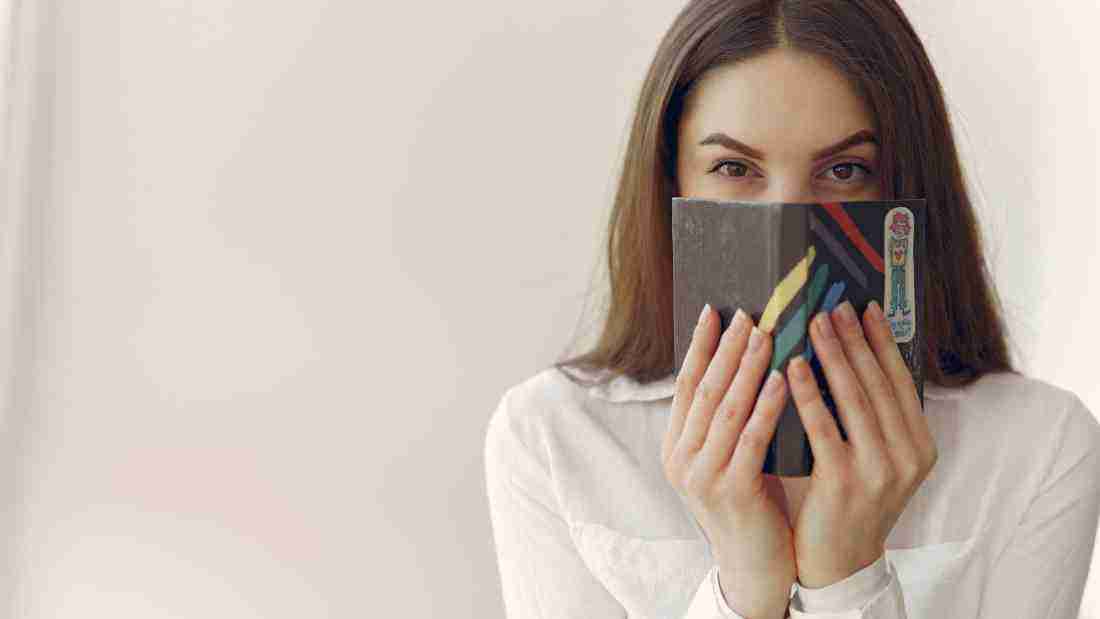 A woman pretending to be shy