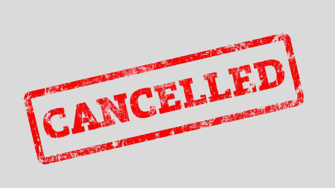 A big red sign saying CANCELLED