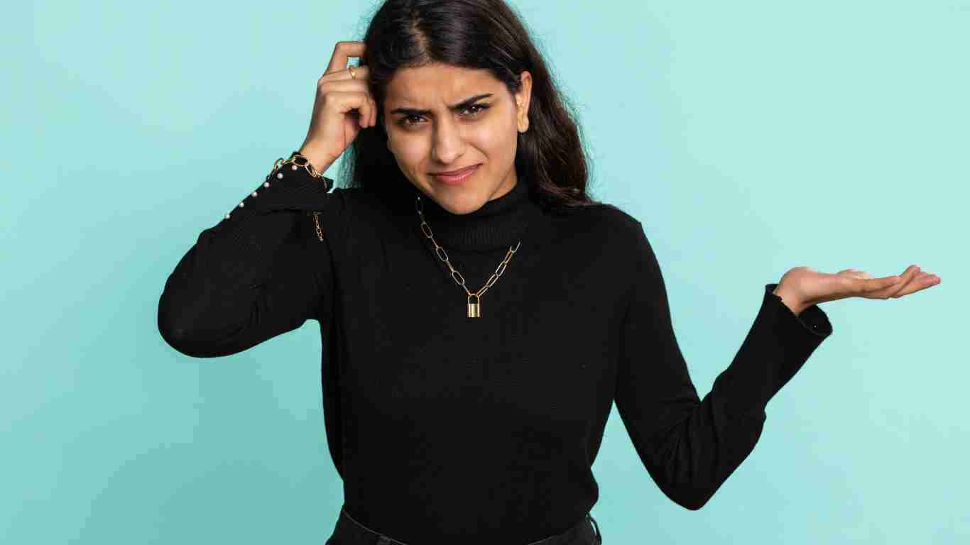 A confused woman who is the victim of gaslighting