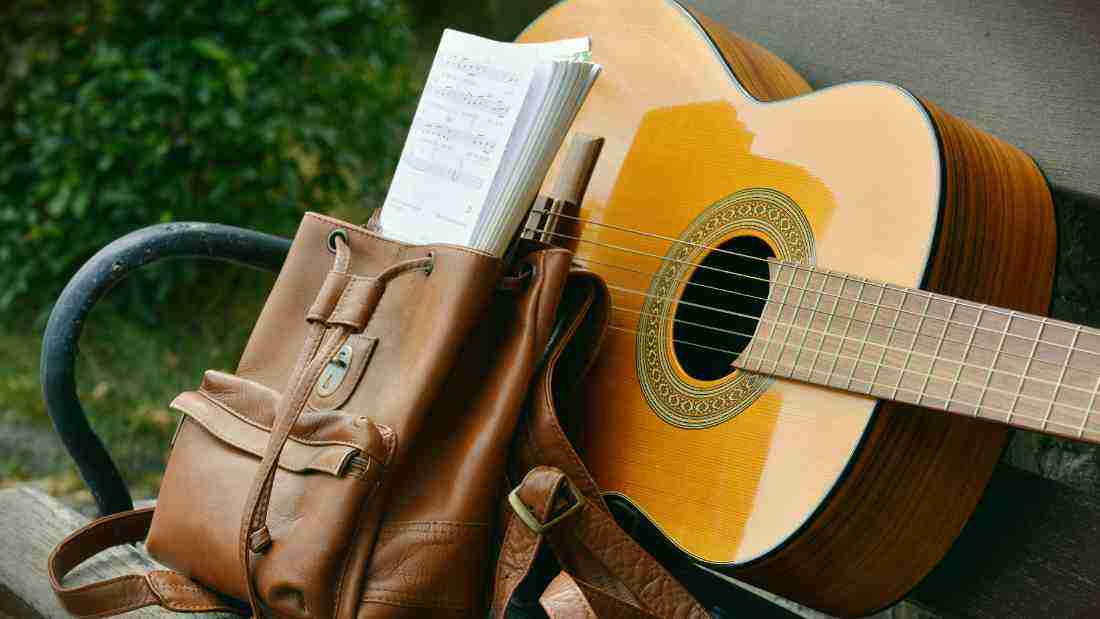 A guitar and sheet music
