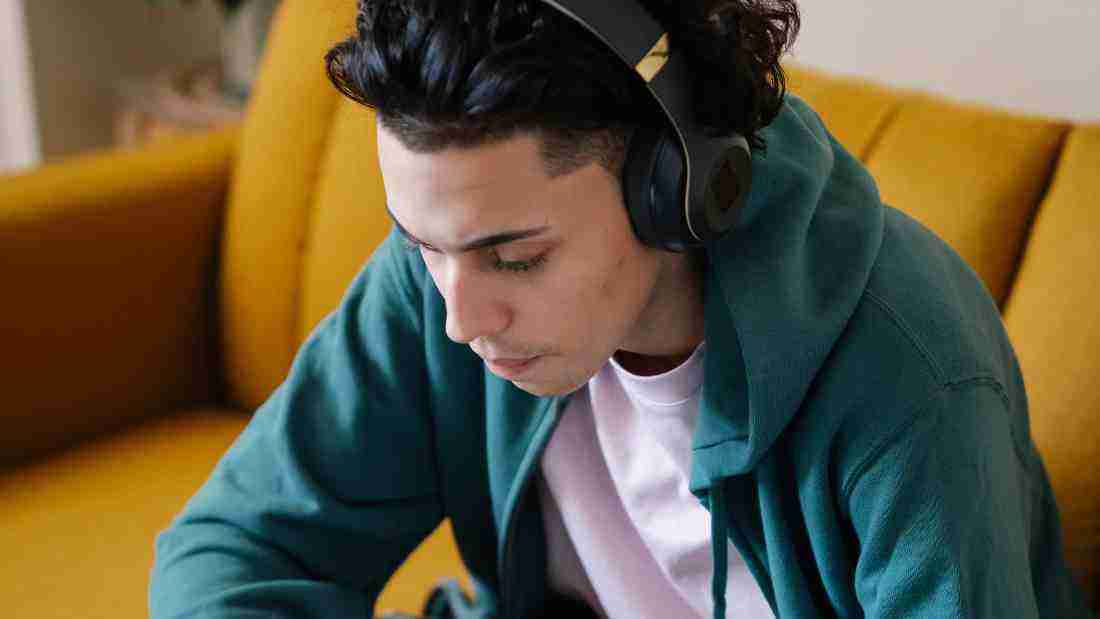 Young man listening to music