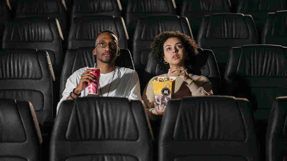 People watching a movie at the cinema