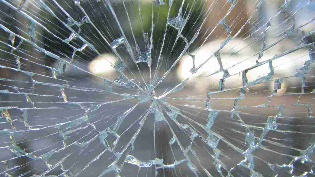 Shattered glass representing broken trust