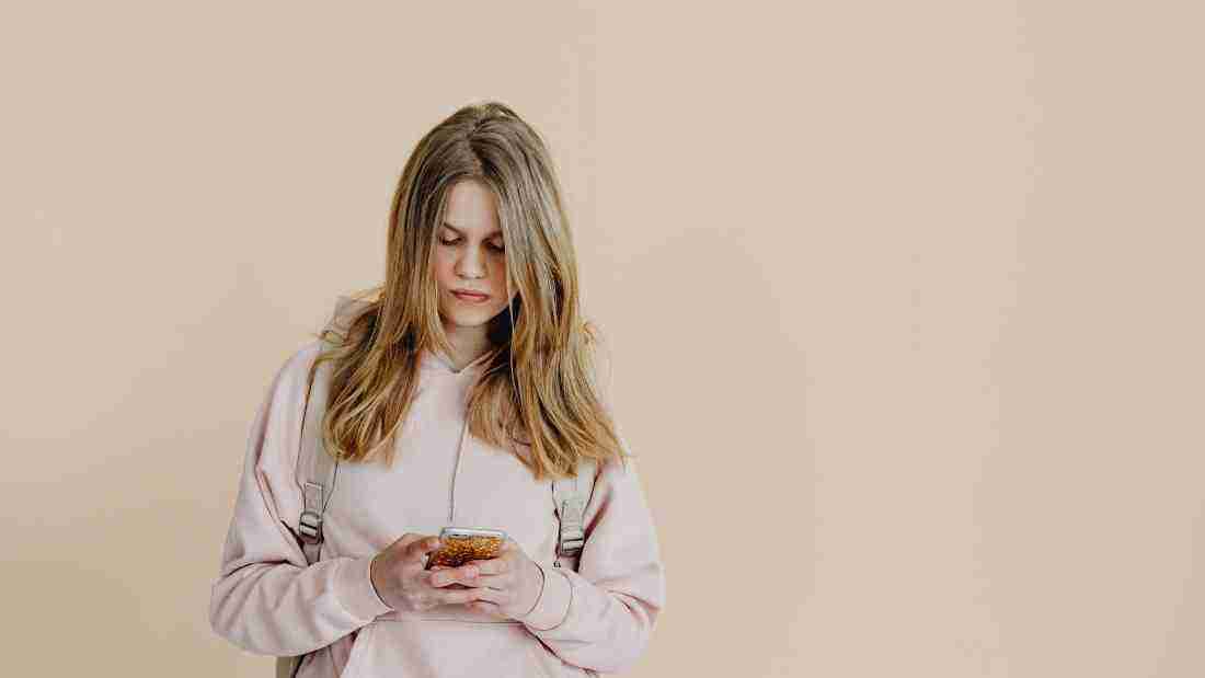 Young woman texting