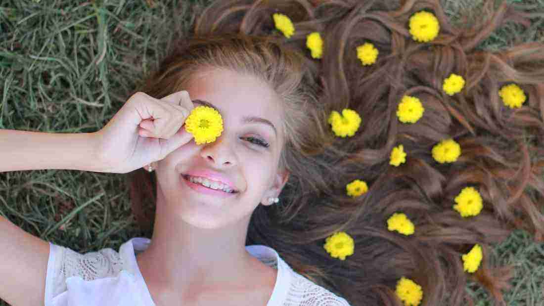 A beautiful young woman with flowers in her hair