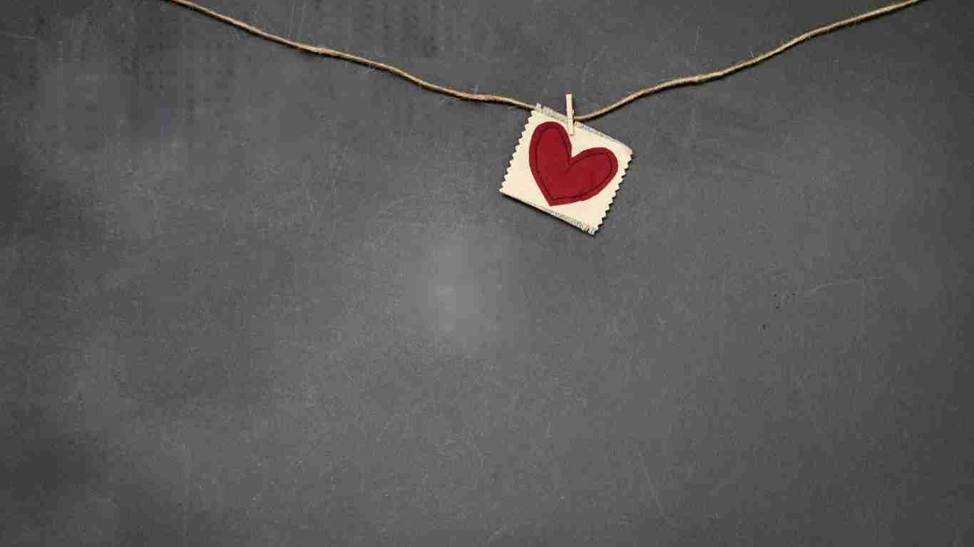 A heart hanging from a washing line