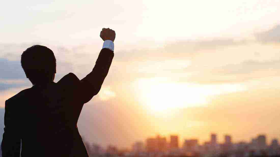 A man celebrating his success