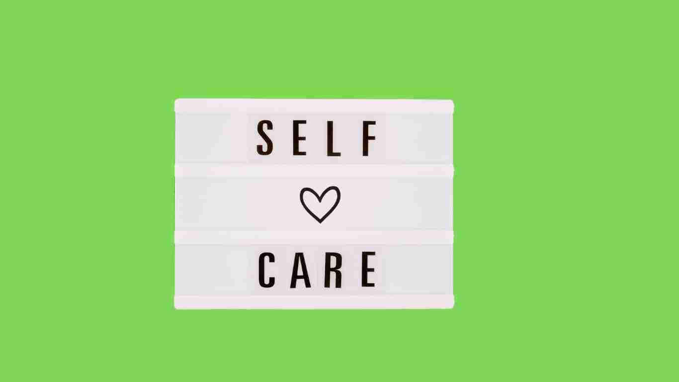 A sign that says SELF CARE