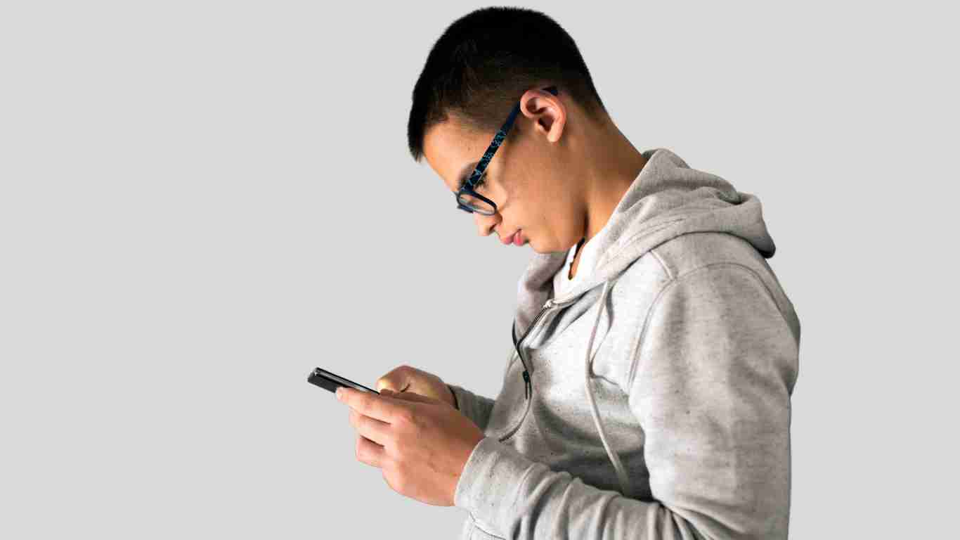 A young man browsing social media