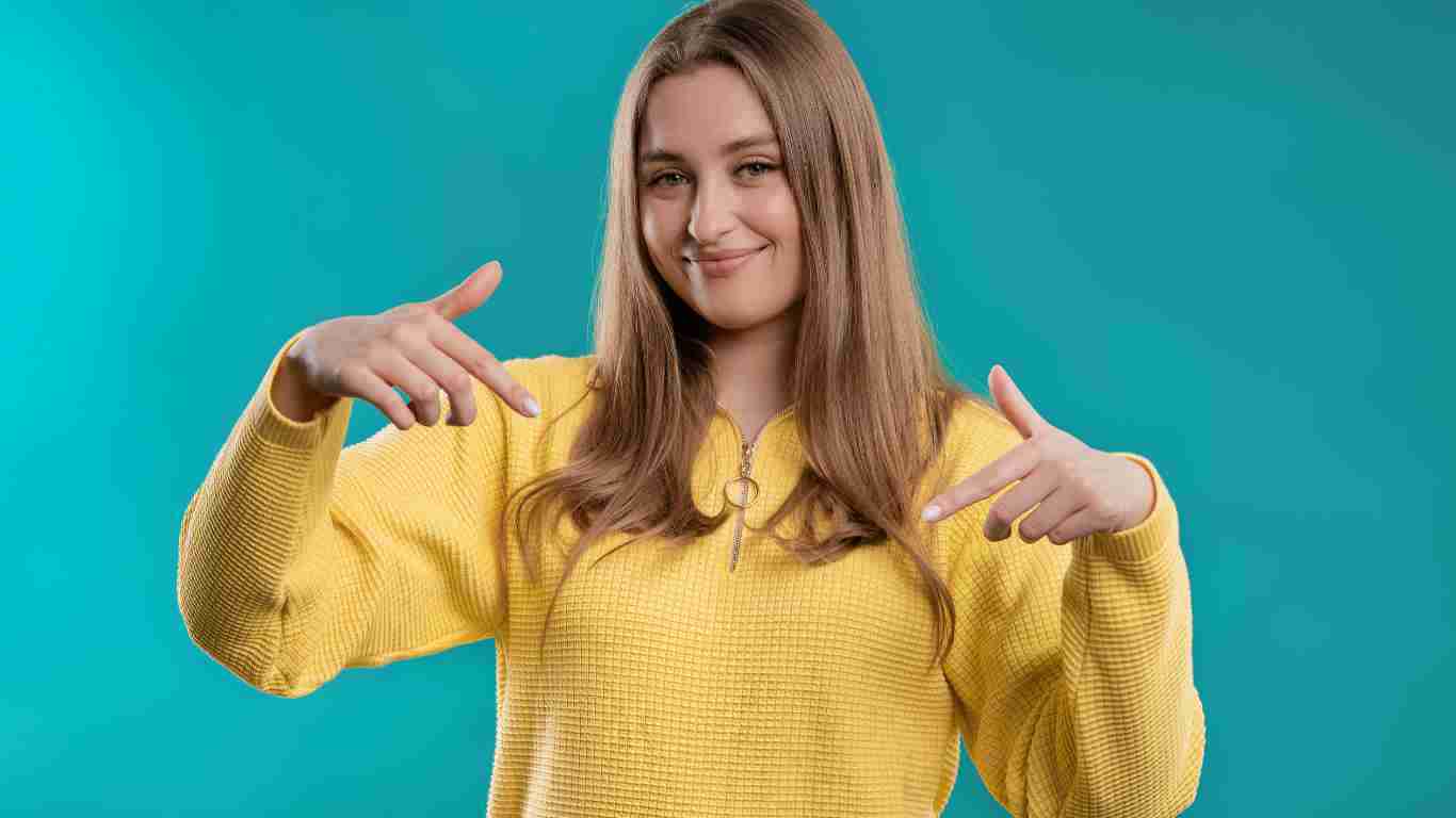 A young woman showing off