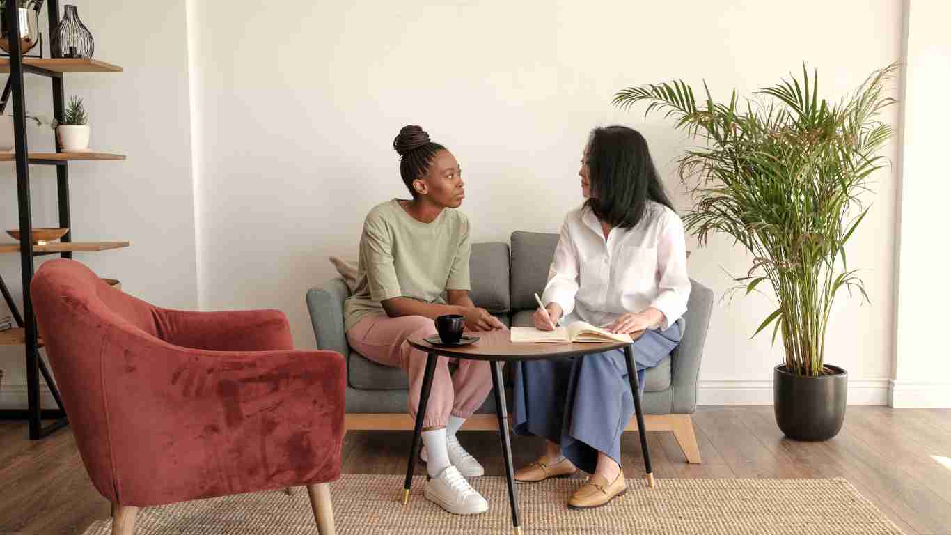 A female therapist talking to her client