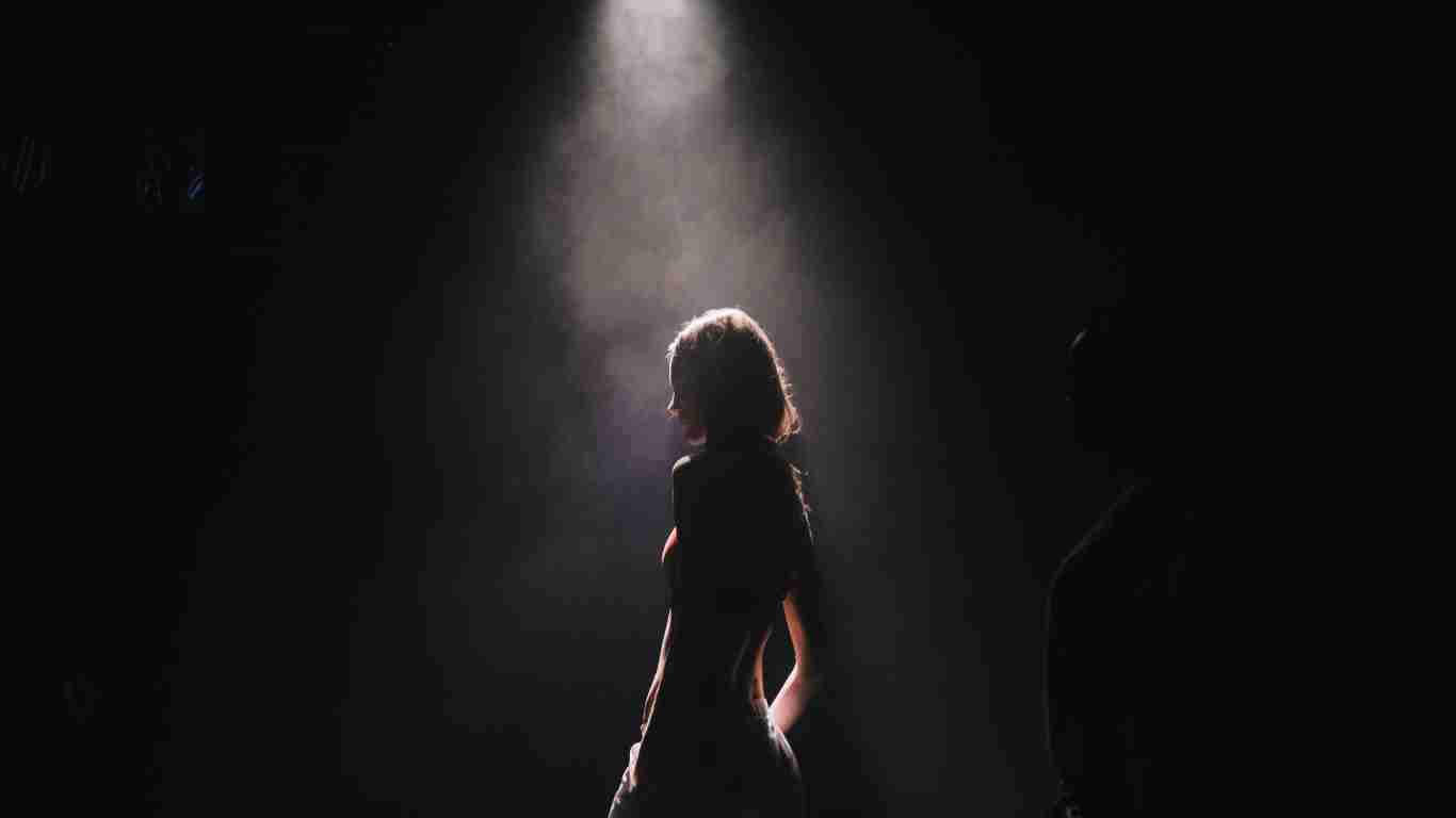 A woman in the spotlight