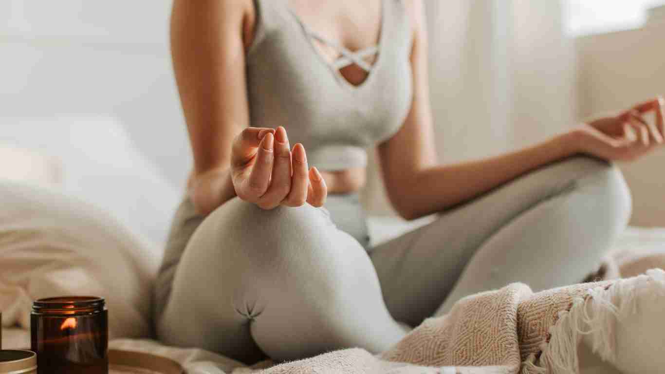 woman practicing yoga and meditation
