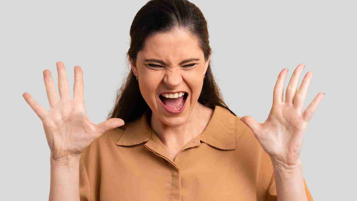 An enraged woman screaming