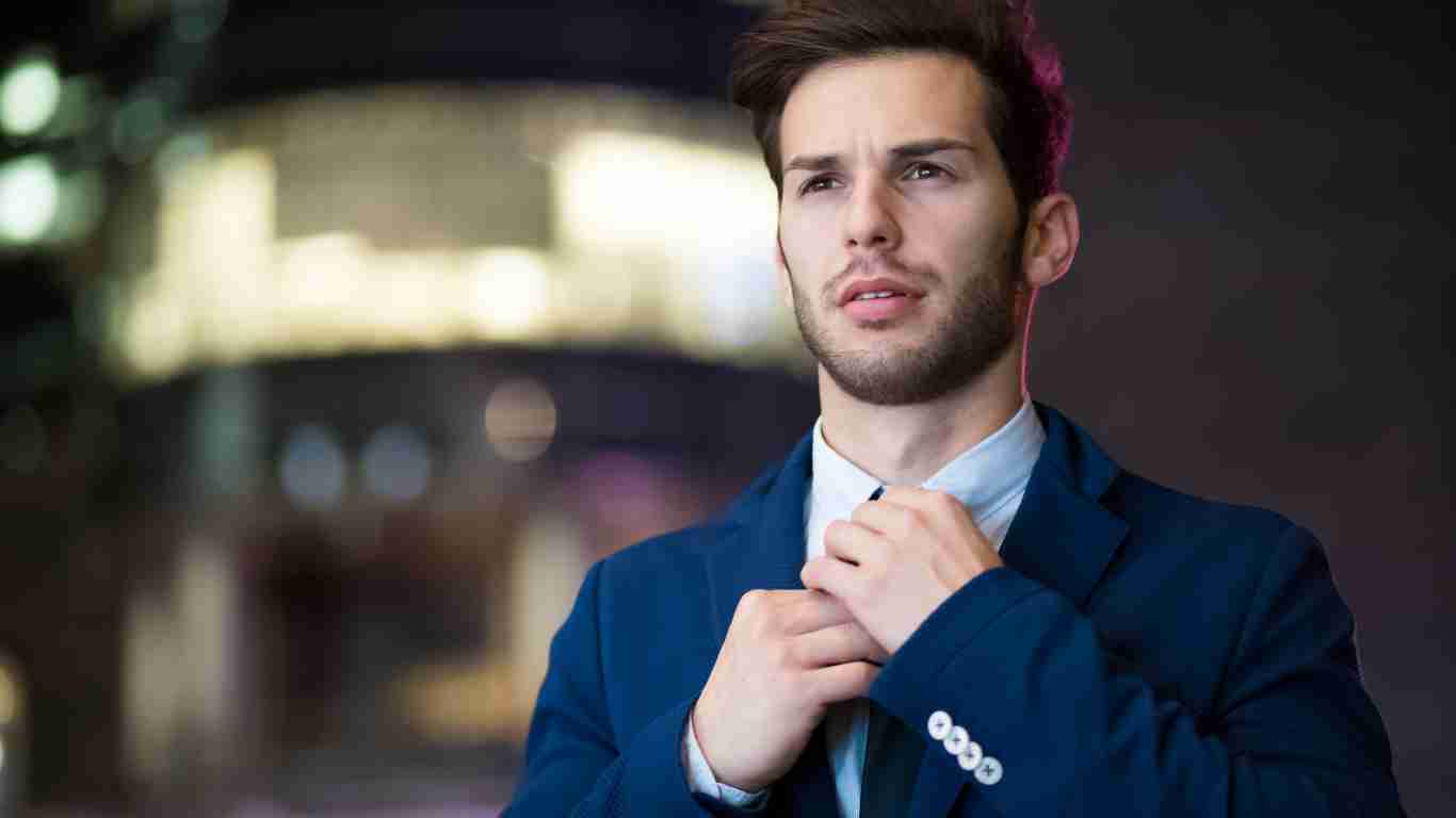 An arrogant man in a sharp suit