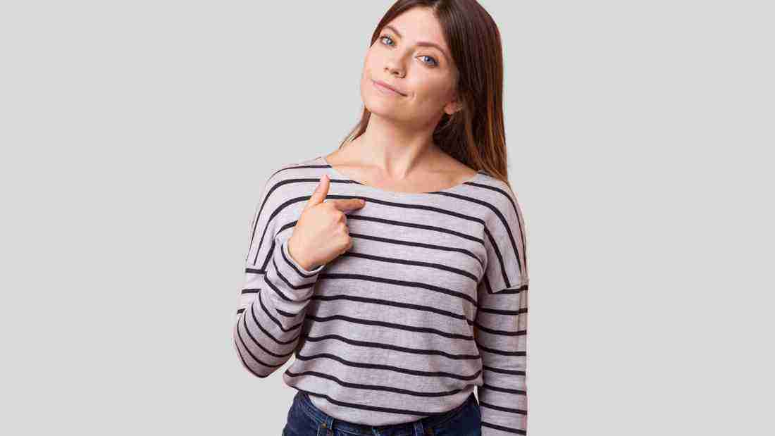 A self-centred woman pointing to herself