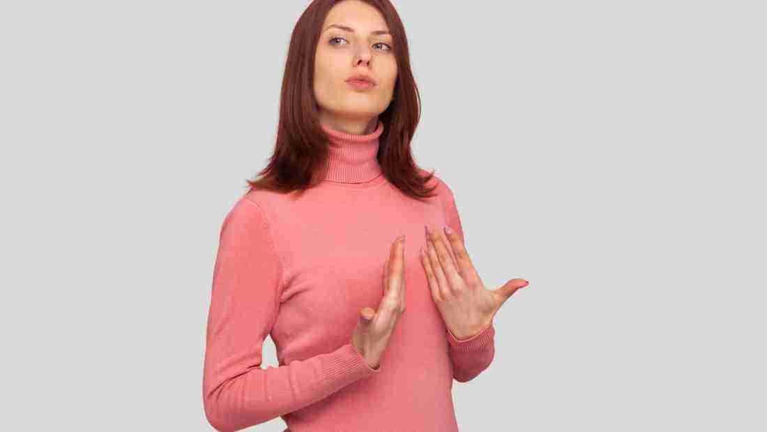 A self-centred woman pointing to herself