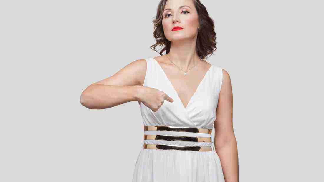 A self-centred woman pointing to her chest